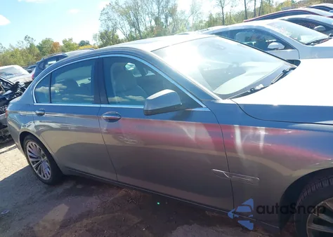 2011 BMW 750Li z USA, uszkodzony, nr VIN WBAKB8C56BCY65532